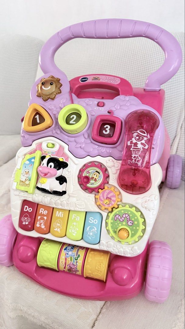 VTech Sit-to-Stand Learning Walker Pink (Category: Infant Playtime) located in Imus. Submitted by gclmom (Listing ID 1469197052, Image 2). Description: - only issue is the little crack sa #2 The rest is like new and working With freebie Lalamove only Loc imus cavite.