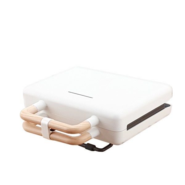 Waffle Maker (Category: Breadmakers) located in Quezon City. Submitted by cornpaperplane (Listing ID 1469298967, Image 1). Description: - Model: WM-043 (Aesthetic Design Series) - Color/Design: Clean white body with chic light wood-grain handles - Interior: Non-stick grill plates for easy cooking and cleaning - Plug-in standard kitchen appliance Never opened. Pm for photos Rfd: don't need it!!.