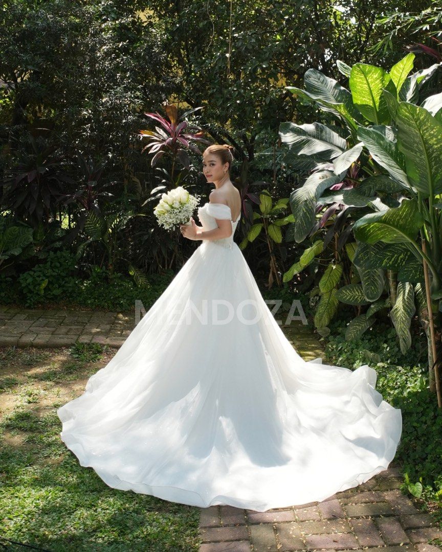 Wedding Gown with Pearl Details (Category: Evening dresses & gowns) located in Manila. Submitted by itsmaxxx28 (Listing ID 1469179761, Image 2). Description: Your “I Do” dress is already here, future Mrs. 👰💝 Selling my pre-loved wedding gown, worn once last April 24, 2026 bought from Belle & Bride Bridal Boutique. Gown details:✨ - Size: Fits SMALL to MEDIUM - Adjustable strap at the back - Padding included inside gown ✅Dry Cleaned ✅Worn Once ✅V