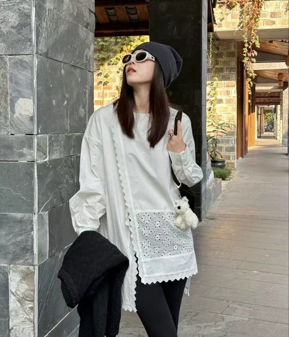 White Asymmetric Lace Panel Long Sleeve Blouse (Category: Longsleeves) located in Taguig. Submitted by mengxir20193848 (Listing ID 1466679406, Image 2). Description: - Color: White - Fit: Loose oversized fit, great for casual wear - Material: Lightweight and comfortable cotton - Design: Asymmetric layered style with eyelet embroidery lace panels - Details: Chic scallop hemline and round neckline (pullover style).