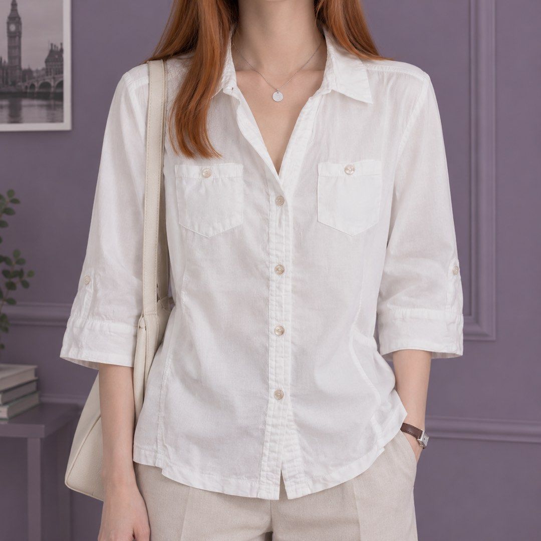 White button-down shirt with pockets 3/4 sleeves (Category: Blouses) located in Daraga. Submitted by nanasnonsense (Listing ID 1469276597, Image 1). Description: PROMO! BUY 9 FOR 500 + GET 1 FREE - applicable for PHP 79 tops and/or dresses from my listings - choose free item from free pile Items are all preloved or thrifted so please manage your expectations. Thank you!.