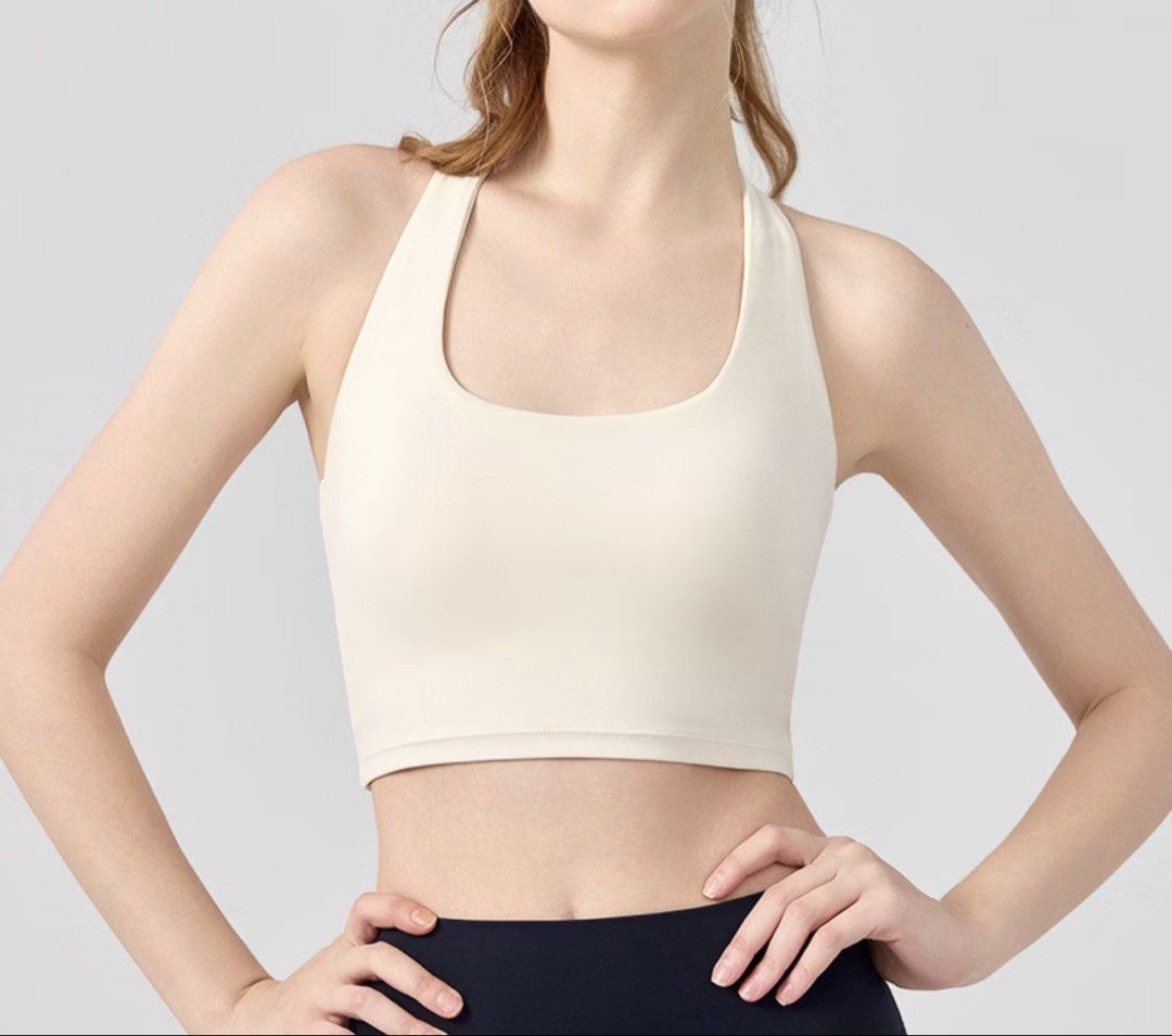 White Ivory Yoga Top (Category: Activewear) located in Quezon City. Submitted by jrlcloset (Listing ID 1469279199, Image 2). Description: Negotiable Padded Size (refer to the photo above) Decluttering .