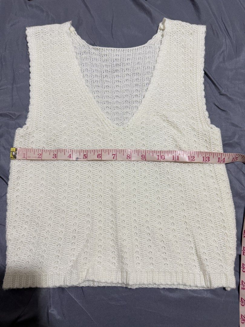 White Knitted V-Neck Sweater Vest (Category: Sleeveless) located in Marikina City. Submitted by louvy.r (Listing ID 1469311842, Image 2). Description: .