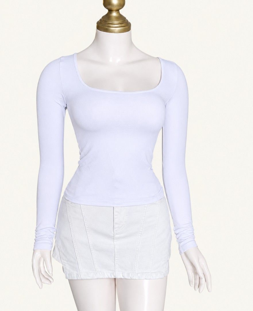 White longsleeves (Category: Longsleeves) located in Angeles City. Submitted by milovewardrobe (Listing ID 1469228493, Image 1). Description: Xs on tag. Can fit upto 34 bust (stretch).