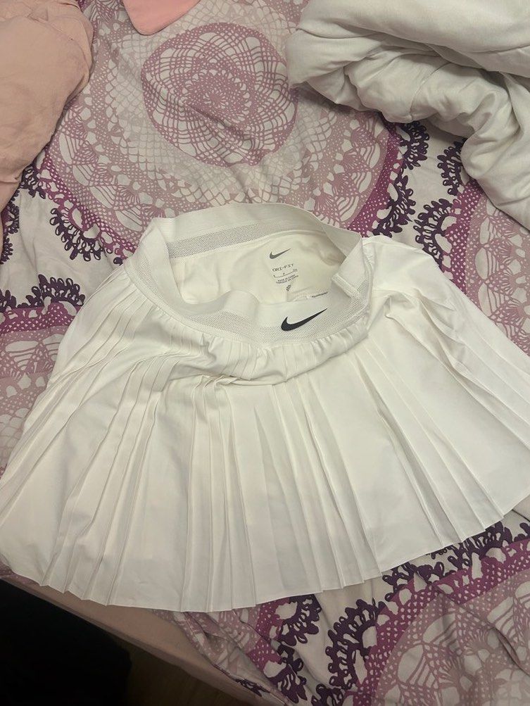 White Nike skirt (Category: Activewear) located in Manila. Submitted by coquettecosette (Listing ID 1469198199, Image 1). Description: Brand new authentic comfortable white nike tennis skirt! Perfect for all kinds of sports!🤍🎾.