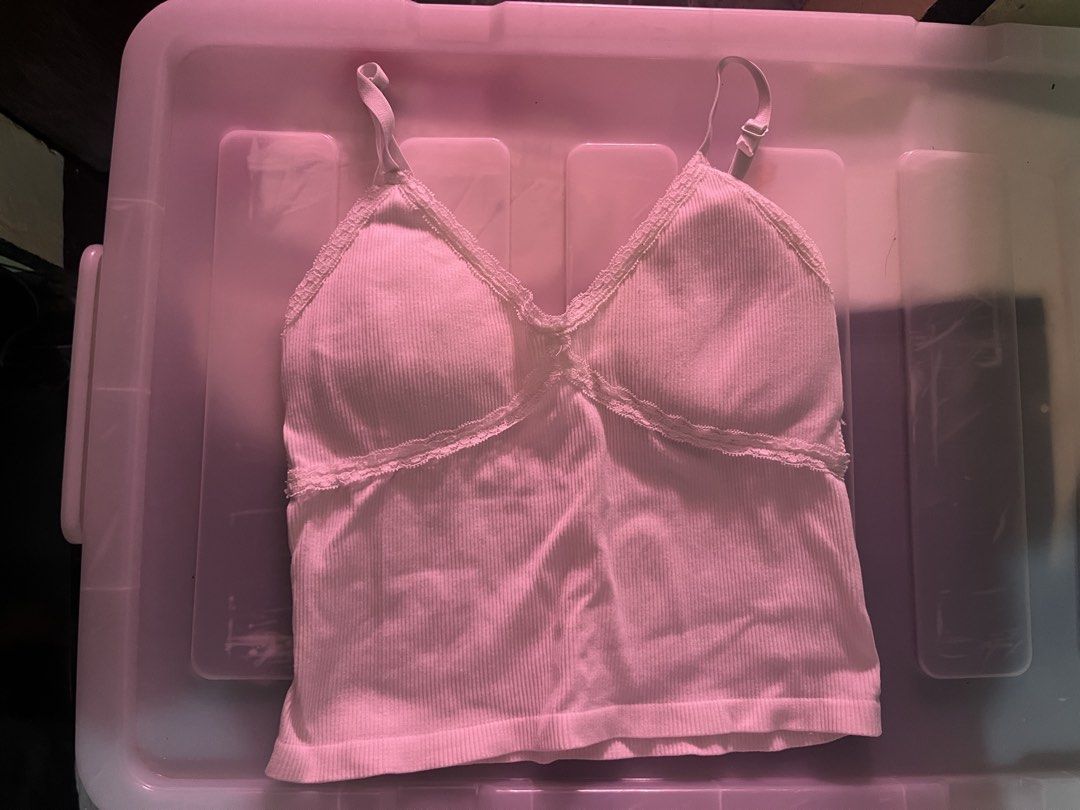 White Ribbed Camisole with Lace Trim (Category: Sleeveless) located in Pakil. Submitted by jjeiikyu (Listing ID 1469314022, Image 1). Description: - Color: White - Material: Soft, stretchy cotton-blend knit with ribbed texture - Design: Delicate lace trim on neckline and under-bust - Fit: Adjustable spaghetti straps and straight hem - Style: Simple and versatile layering piece.