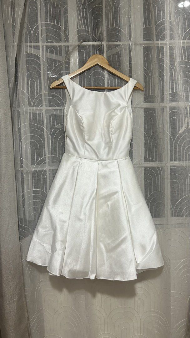 White Satin A-Line Mini Dress (Custom Made) (Category: Dresses) located in Malabon City. Submitted by ambertua (Listing ID 1469167656, Image 3). Description: White Satin A-Line Mini Dress (Custom Made) Custom-made white satin mini dress with a scoop neckline, fitted bodice, and a full pleated skirt. Deep V open back. Elegant and structured, great for bridal showers, civil weddings, graduations, or any occasion that calls for white. Note: For refe