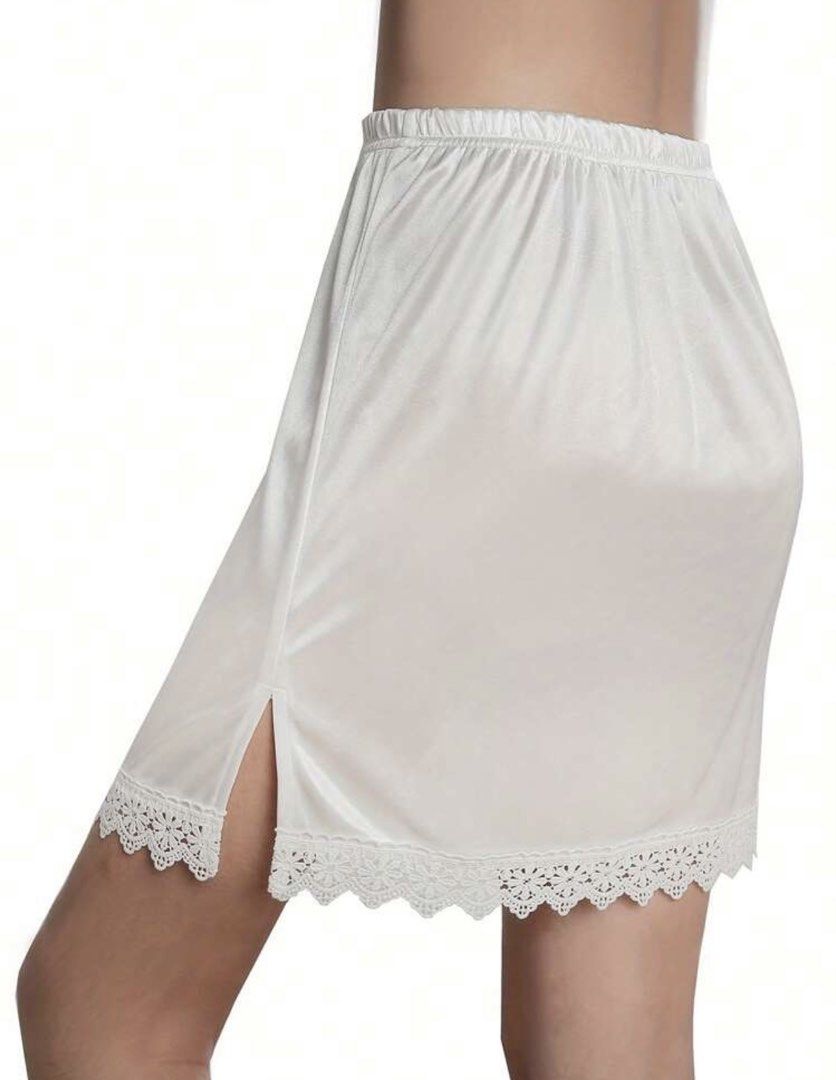 White Satin Lace Half Slip Skirt Extender (Category: Skirts) located in Cagayan de Oro. Submitted by redbluerider (Listing ID 1469167953, Image 1). Description: - Color: Classic White - Material: Smooth, silky satin - Fit: Stretchy elastic waistband for comfort - Design: Delicate floral lace trim and convenient side slit for easy movement - Purpose: Provides smooth coverage under skirts and dresses.