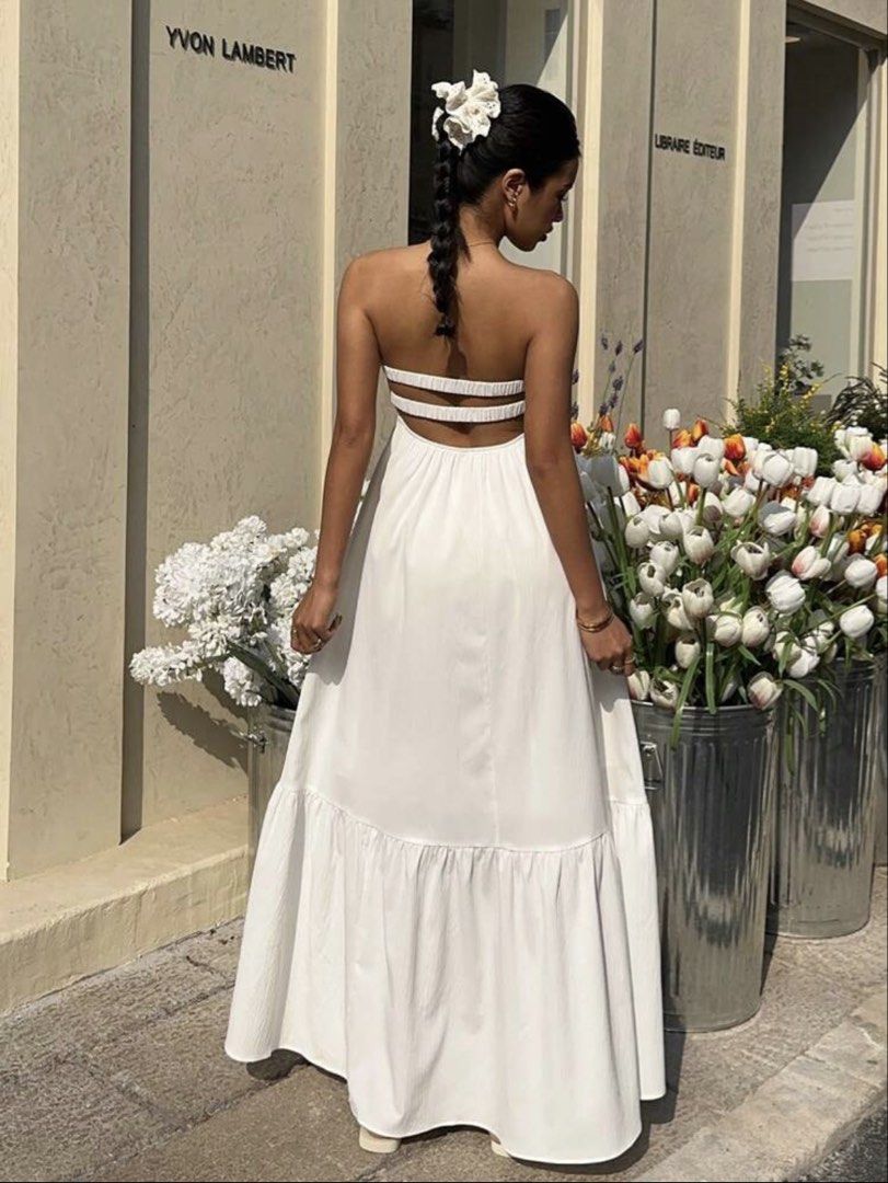 White strapless maxi long dress (Category: Dresses) located in Taguig. Submitted by ls_ln (Listing ID 1469194425, Image 3). Description: - Color: White - Size: XS-S - Occasion: Ideal for beach days, vacations, or casual weekend hangouts.
