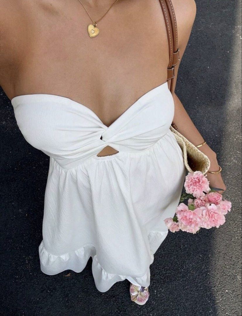 White strapless maxi long dress (Category: Dresses) located in Taguig. Submitted by ls_ln (Listing ID 1469194425, Image 2). Description: - Color: White - Size: XS-S - Occasion: Ideal for beach days, vacations, or casual weekend hangouts.