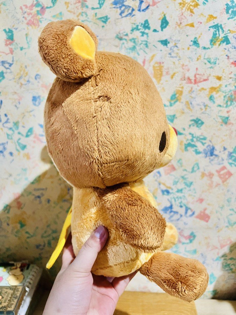 Wind-up Truffle Plush Toy (Category: Plushies & Soft Toys) located in Taguig. Submitted by lae.onlineshop (Listing ID 1469392914, Image 3). Description: Wind-up Truffle Plush Toy *With etiketa(TAITO) and paper tag *Clockwork Truffle Bear Plush *THE COLOR MAY SLIGHTLY DIFFER FROM ACTUAL DUE TO LIGHTING AND/OR SCREEN RESOLUTION. Size: approx 30cm (ear to toe) Issue: zero to minimal cleaning needed, may small flaw sa nose (see last photo), AS IS. ‼️