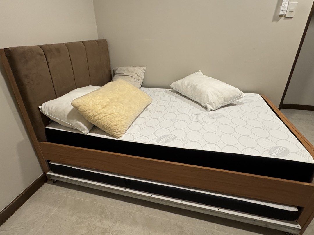 Wooden Pull-out Bed with Upholstered Headboard (Category: Bed Frames & Mattresses) located in Manila. Submitted by shielayson (Listing ID 1469305387, Image 1). Description: • Semi-Double standard size • With pull-out bed (semi double) • Pull-out bed has wheels for easy opening/closing • Made from laminated 11-ply melamine plywood with support ng bakal • Suede upholstered headboard Perfect for a guest room, kids’ room, or bedroom with limited spac
