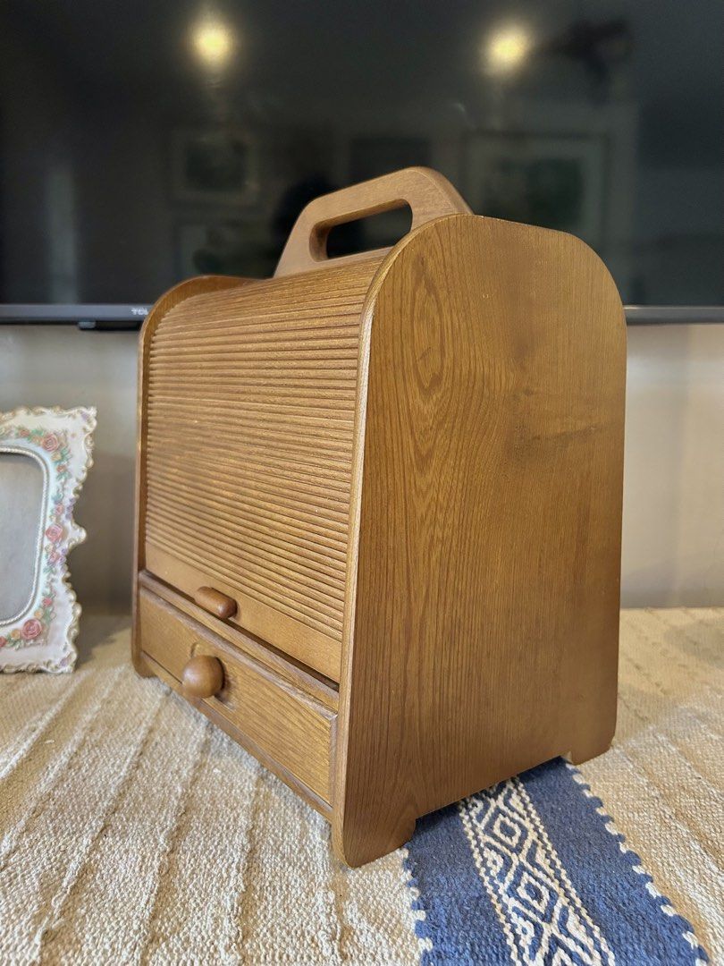 WOODEN ROLL-TOP VANITY/MAKE UP BOX (Category: Other Home Decor) located in Polangui. Submitted by joycehaul (Listing ID 1469298762, Image 2). Description: vintage wooden roll-top makeup/cosmetic box (or tabletop vanity organizer) featuring a tambour/slatted shutter door, a top carrying handle, and a bottom drawer with a round wooden knob..