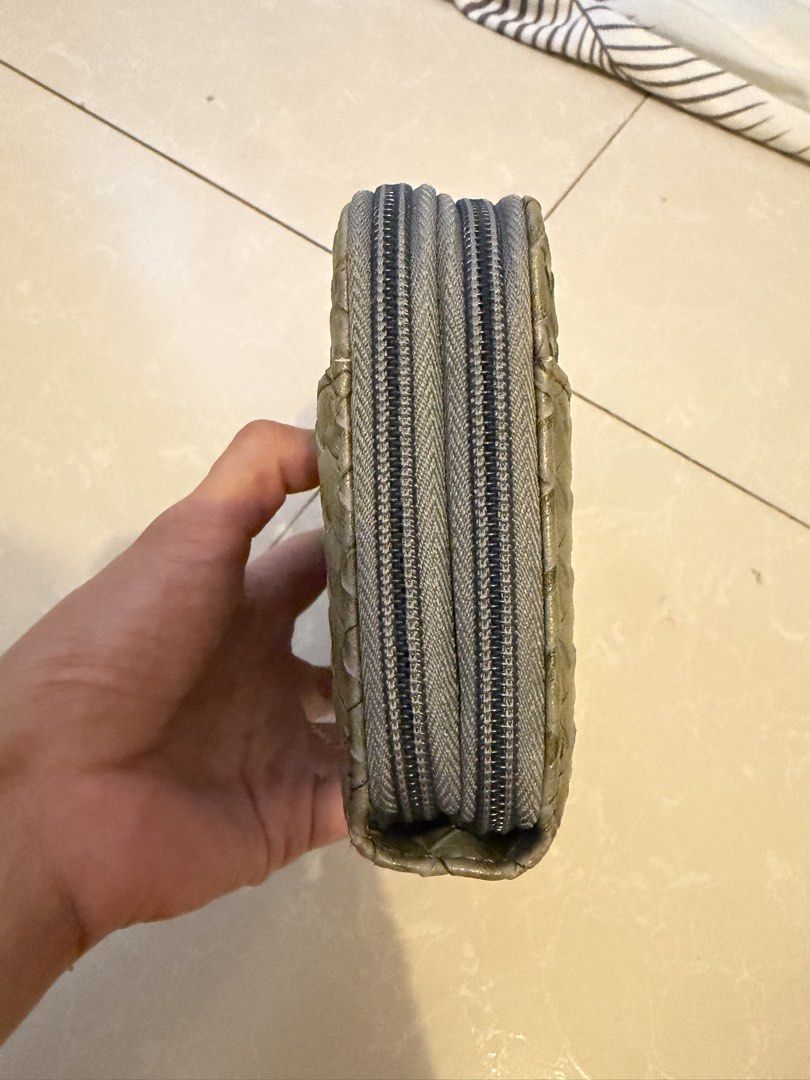 Woven double zip long wallet (Category: Wallets & Card holders) located in Las Pinas. Submitted by bibliomomma (Listing ID 1469237607, Image 3). Description: Woven Olive Green Double-Zip Long Wallet Stylish woven design long wallet sourced from Japan (made in Myanmar) featuring a doublezip closure for extra storage capacity. Includes multiple card slots and cash compartments to keep your essentials organized. Preloved condition with visible inter