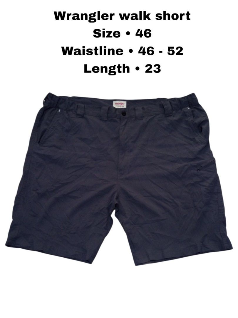 Wrangler Authentics Walk Short Size 46 Dark Grey (Category: Shorts) located in Magdalena. Submitted by magdalenathrift20 (Listing ID 1469168478, Image 1). Description: - Brand: Wrangler Authentics - Item: Walk shorts - Color: Dark grey - Size: 46 (Waist stretches from 46" to 52") - Length: 23" - Material: 100% polyester - Origin: Made in Bangladesh - Features: Zippered side pocket, solid construction - Condition/Use: Great for casual everyday wea