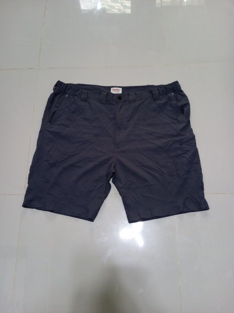 Wrangler Authentics Walk Short Size 46 Dark Grey (Category: Shorts) located in Magdalena. Submitted by magdalenathrift20 (Listing ID 1469168478, Image 2). Description: - Brand: Wrangler Authentics - Item: Walk shorts - Color: Dark grey - Size: 46 (Waist stretches from 46" to 52") - Length: 23" - Material: 100% polyester - Origin: Made in Bangladesh - Features: Zippered side pocket, solid construction - Condition/Use: Great for casual everyday wea