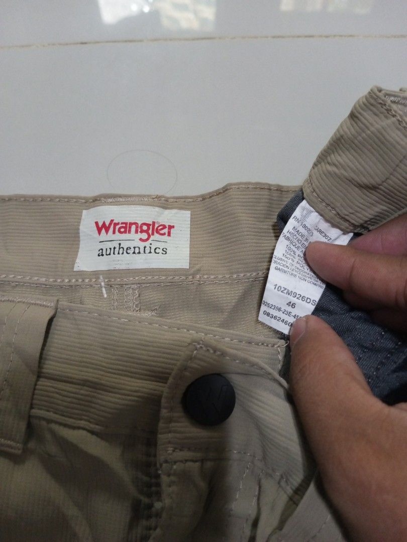 Wrangler Authentics Walk Short Size 46 Khaki (Category: Shorts) located in Magdalena. Submitted by magdalenathrift20 (Listing ID 1469168500, Image 3). Description: - Brand: Wrangler Authentics - Item: Khaki Walk Shorts - Size: 46 (Adjustable waist fits 46 to 52 inches) - Length: 23 inches - Material: 100% Polyester - Features: Secure side zip pocket, button closure, and belt loops - Condition: Clean and well-maintained.