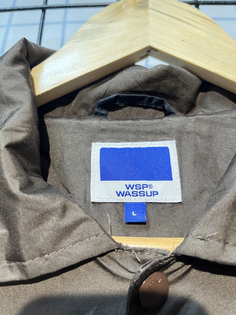 WSP Wassup Brown Coach Jacket Size L (Category: Coats, Jackets and Outerwear) located in Taal. Submitted by thrift_deals23 (Listing ID 1469185172, Image 3). Description: - Brand/Model: WSP Wassup brown coach jacket - Size: L - Details: Snap-button front closure, embroidered chest logo, regular collar, dark inner lining, and adjustable hem drawstrings with toggles - Condition: Clean piece, worn just a few times - Style: Great outer layer for daily