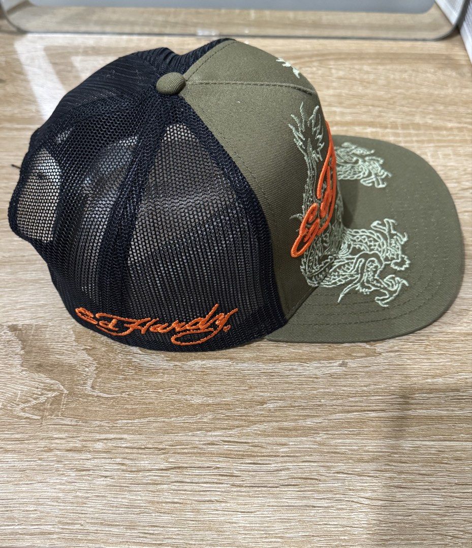 WTT Ed Hardy Dragon Trucker Snapback Cap (Category: Caps & Hats) located in Baguio. Submitted by luvforsim (Listing ID 1469170997, Image 2). Description: • Strictly for trading only! • Bought this at a flea market • Have: Olive and orange colorway • Want: Pink and black colorway (in the picture) - please dm me if u have it !! .