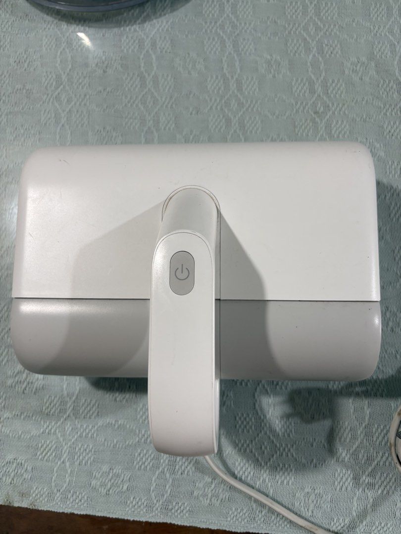 Xiaomi Mijia Wireless Dust Mite Vacuum Cleaner (Category: Vacuum Cleaner & Housekeeping) located in Muntinlupa City. Submitted by koi_143 (Listing ID 1469211567, Image 1). Description: - Brand/Model: Xiaomi Mijia Dust Mite Vacuum Cleaner (MJCMY01DY) - Color: White and grey - Power: 350W, 220V (Standard PH plug with long cord) - Features: Top power button, operation indicator light, rotating brush roll, and bottom ventilation grilles - Condition: 