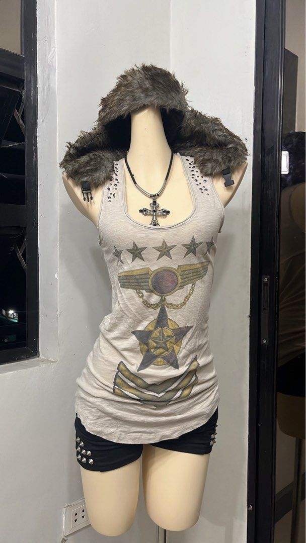 Y2k grunge army tanktop with studs (Category: Sleeveless) located in Caloocan City. Submitted by onlyfromthepast (Listing ID 1469255805, Image 2). Description: 9/10 condition Medium ✅My bio before purchasing tia💕 ✅ All items are fresh from bales, Pls expect dirt,dust or stains.