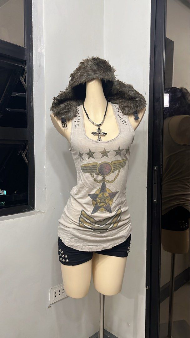 Y2k grunge army tanktop with studs (Category: Sleeveless) located in Caloocan City. Submitted by onlyfromthepast (Listing ID 1469255805, Image 1). Description: 9/10 condition Medium ✅My bio before purchasing tia💕 ✅ All items are fresh from bales, Pls expect dirt,dust or stains.