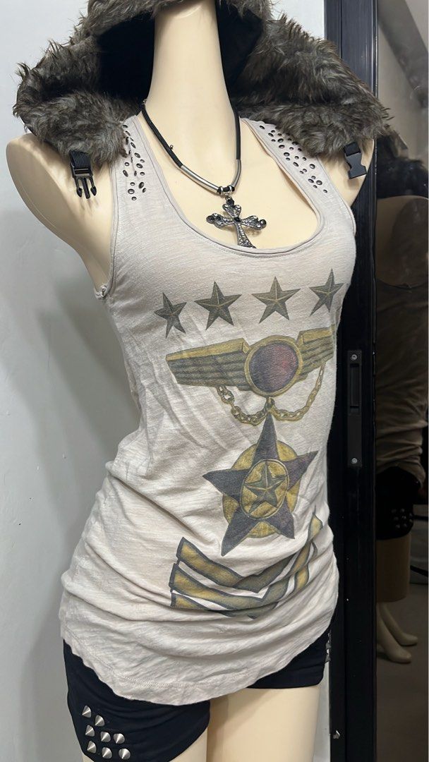 Y2k grunge army tanktop with studs (Category: Sleeveless) located in Caloocan City. Submitted by onlyfromthepast (Listing ID 1469255805, Image 3). Description: 9/10 condition Medium ✅My bio before purchasing tia💕 ✅ All items are fresh from bales, Pls expect dirt,dust or stains.