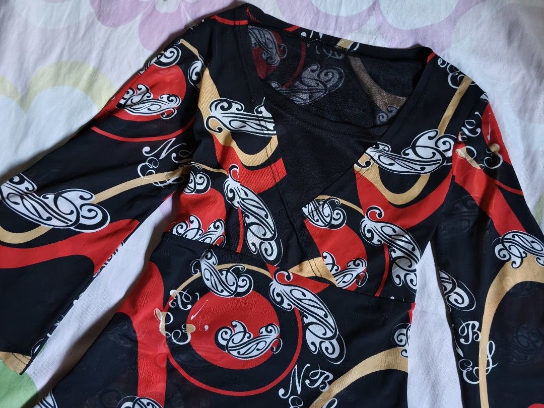 Y2K Whimsigoth Abstract Printed Mesh Bell-Sleeve Blouse (Category: Longsleeves) located in Pulilan. Submitted by hly_cllctn (Listing ID 1469253120, Image 2). Description: Y2K Whimsigoth Abstract Printed Mesh Bell-Sleeve Blouse Small to Medium Mine: 129 pesos Lock: 159 pesos (au).