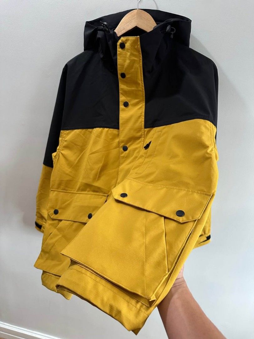 Yellow Black Two-Tone Hooded Windbreaker Jacket (Category: Coats, Jackets and Outerwear) located in Caloocan City. Submitted by jefferson85212 (Listing ID 1469309155, Image 3). Description: GU UTILITY PARKA SIZE S ON TAG 21X27 DIMES GOOD AS NEW .
