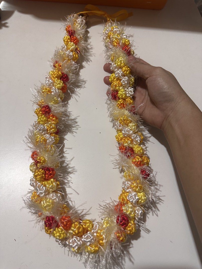 Yellow Themed Hawaiian Lace (Category: Necklaces) located in Davao. Submitted by favoritepreloved (Listing ID 1469266707, Image 1). Description: 💜 Made of fabric ribbon 💜 88cm .