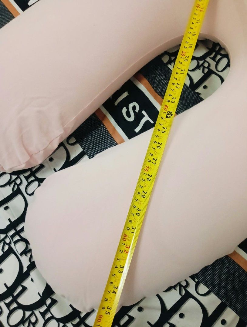 Yogibo Support Pink U-Shaped Pillow (Category: Breastfeeding & Bottle Feeding) located in Manila. Submitted by annetteasi22390 (Listing ID 1469173996, Image 1). Description: - Authentic Yogibo Support pillow in pink - Ideal for lounging, nursing, or pregnancy support - Measures approximately 90 cm long - Removable and washable cover with a secure zipper closure - Excellent, clean condition with zero stains or marks - Tag attached near the bottom 