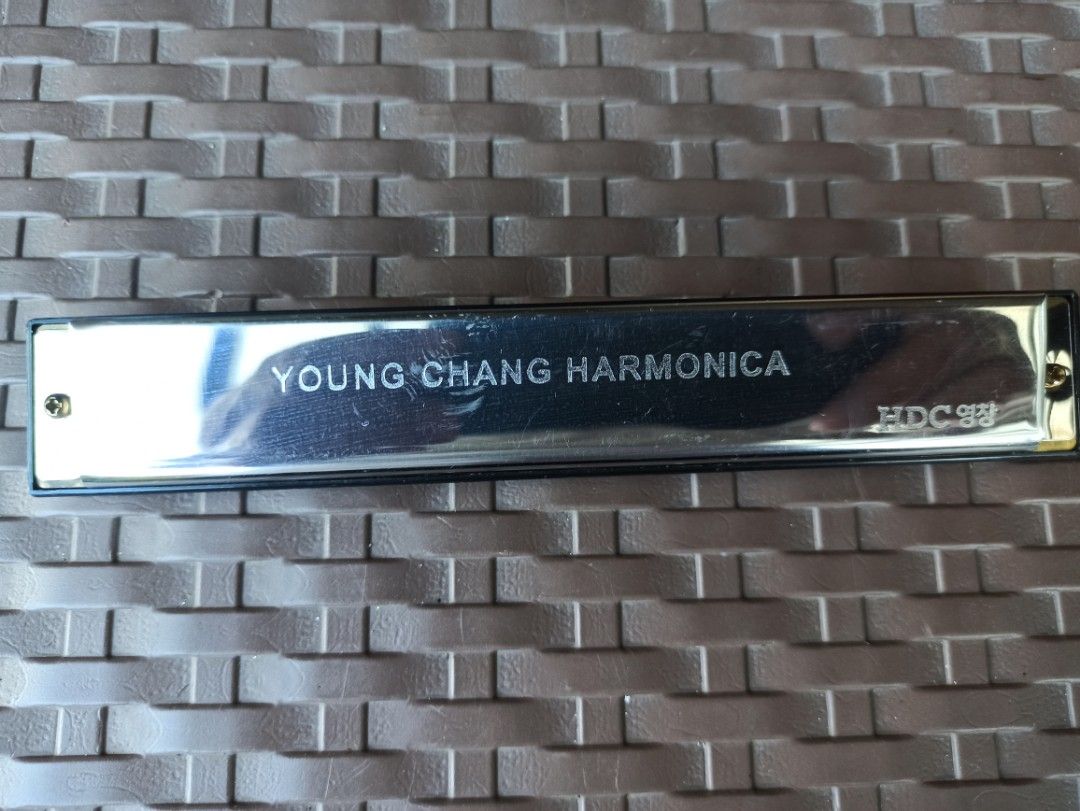 Young Chang HDC Harmonica Silver Tone - Good conditio without case (Category: Musical Instruments) located in Caloocan City. Submitted by rtarellano (Listing ID 1469287742, Image 1). Description: - Brand: Young Chang (HDC engraved) - Finish: Silver tone - Size: Approx. 6 inches long - Type: Standard tremolo/chromatic style with multiple sound holes - Condition: Clean exterior casing, ready for playing or collecting - Ideal for: Music practice and
