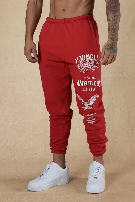 YOUNGLA joggers size L (Category: Activewear) located in Angeles City. Submitted by alejeong27 (Listing ID 1469347560, Image 2). Description: Brand: YoungLA Model Name: The Immortal Joggers (Model 233) Design/Graphics: "Young Ambitious Club" lettering, a rose illustration, and an eagle print down the leg. Color: Red If you're looking to buy these, let me know:.