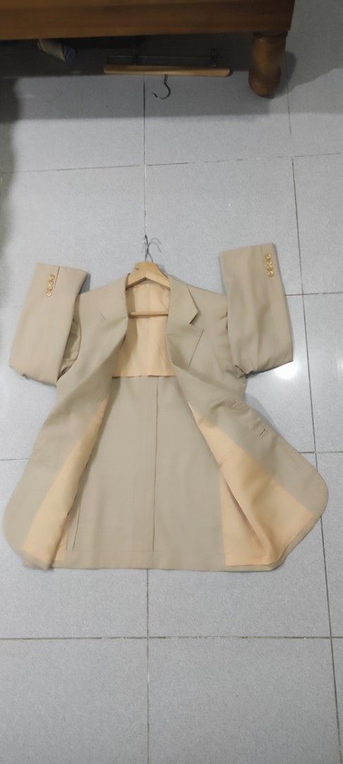 YSL jacket (Category: Coats, Jackets and Outerwear) located in Kota Bharu. Submitted by 58kamarulzaman (Listing ID 1469201622, Image 2). Description: - Brand: Yves Saint Laurent (YSL) - Color: Cream / Off-White - Size: S .Pit18.5Labuh 28.5 - Material: 100% New Wool outer with smooth inner lining - Condition: Excellent pre-owned vintage condition - Features: Signature YSL inner label, classic button-up design, structured fit - Delivery: Free shipp