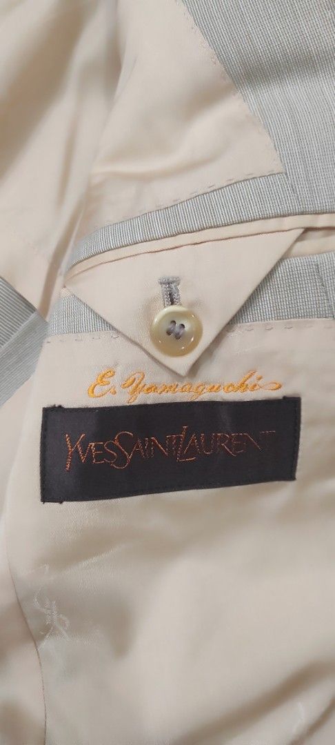 YSL jacket (Category: Coats, Jackets and Outerwear) located in Kota Bharu. Submitted by 58kamarulzaman (Listing ID 1469201622, Image 3). Description: - Brand: Yves Saint Laurent (YSL) - Color: Cream / Off-White - Size: S .Pit18.5Labuh 28.5 - Material: 100% New Wool outer with smooth inner lining - Condition: Excellent pre-owned vintage condition - Features: Signature YSL inner label, classic button-up design, structured fit - Delivery: Free shipp