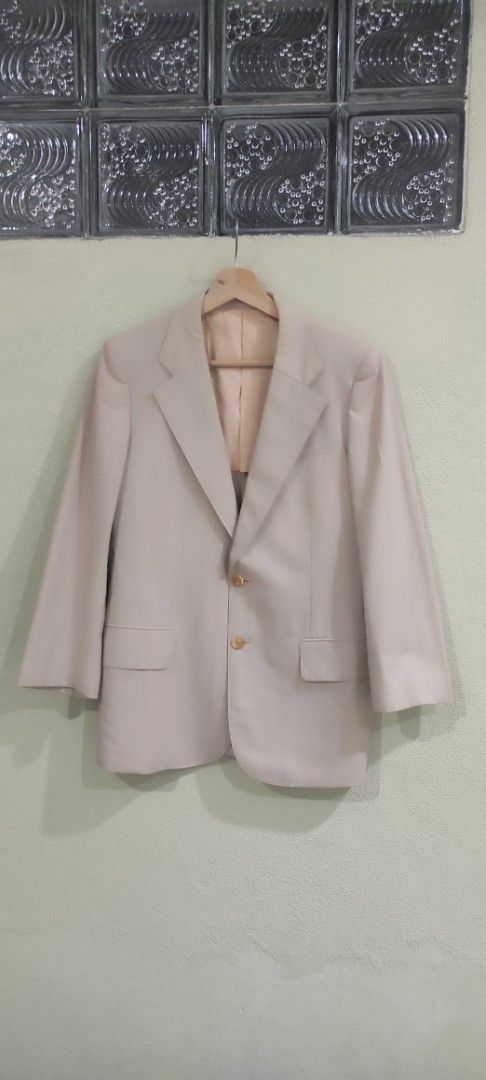 YSL jacket (Category: Coats, Jackets and Outerwear) located in Kota Bharu. Submitted by 58kamarulzaman (Listing ID 1469201622, Image 1). Description: - Brand: Yves Saint Laurent (YSL) - Color: Cream / Off-White - Size: S .Pit18.5Labuh 28.5 - Material: 100% New Wool outer with smooth inner lining - Condition: Excellent pre-owned vintage condition - Features: Signature YSL inner label, classic button-up design, structured fit - Delivery: Free shipp