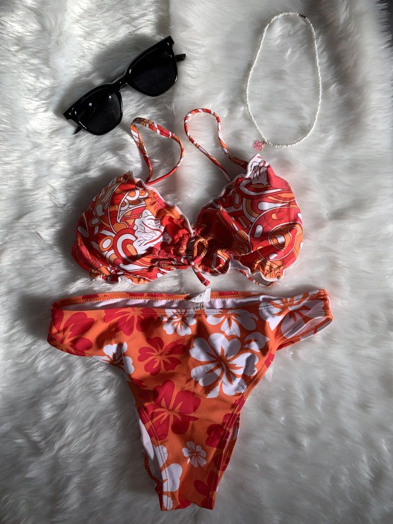 Zaful Gray Smocked Tie Side Bikini Set (Category: Bikinis & Swimsuits) located in Mandaluyong City. Submitted by gentle.segoviajam (Listing ID 1469324186, Image 1). Description: - Condition: Brand new with tags (unworn) - Color: Gray - Material: Heavy smocked texture - Top: Star-like cups with cutouts and thin straps - Bottom: Adjustable tie sides - Best for: Beach days and pool parties.
