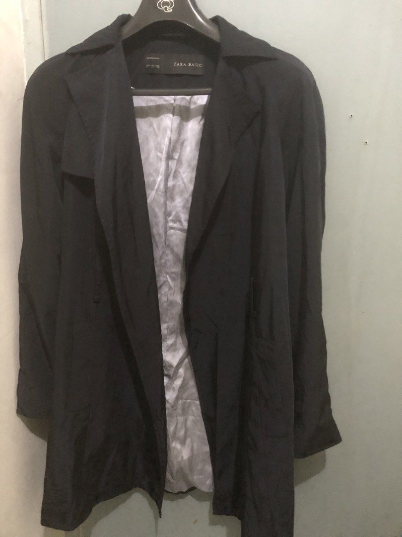 Zara Basic Black Coat Jacket Outerwear (Category: Coats, Jackets and Outerwear) located in Quezon City. Submitted by unique2shop (Listing ID 1469291311, Image 1). Description: - Brand: Zara Basic - Color: Classic black with a chic blue and white vertical striped inner lining - Material: 100% durable polyester - Design: Open front/buttonless with long sleeves and functional front pockets - Care: Machine washable at 30 degrees - Origin: Made in Chi