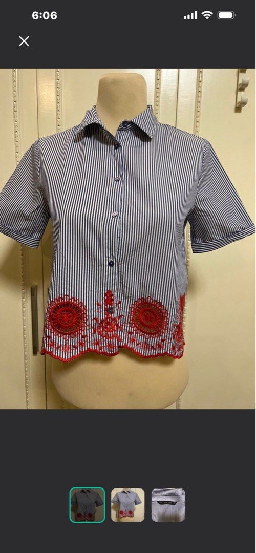Zara Basic Blue White Striped Embroidered Short Sleeve Shirt (Category: Shirts) located in Quezon City. Submitted by letsdeclutter101 (Listing ID 1469380854, Image 3). Description: - Brand: Zara Basic - Size: Small (S) - Design: Blue and white vertical stripes - Features: Short sleeves with folded cuffs, collared neck, front button closure - Detail: Red embroidered cut-out detail along the scalloped hemline.