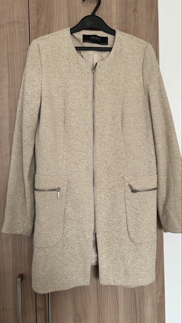 Zara Basic Collection Beige Tweed Zip Jacket Size XL (Category: Coats, Jackets and Outerwear) located in Pasig City. Submitted by eenamagg (Listing ID 1469357220, Image 1). Description: - Brand: Zara Basic Collection - Size: EUR XL / USA XL / MEX 32 - Material/Style: Beige textured tweed fabric with clean interior lining - Closure: Full front silver metal zipper - Pockets: Two functional front pockets with silver zippers - Design: Classic collarl