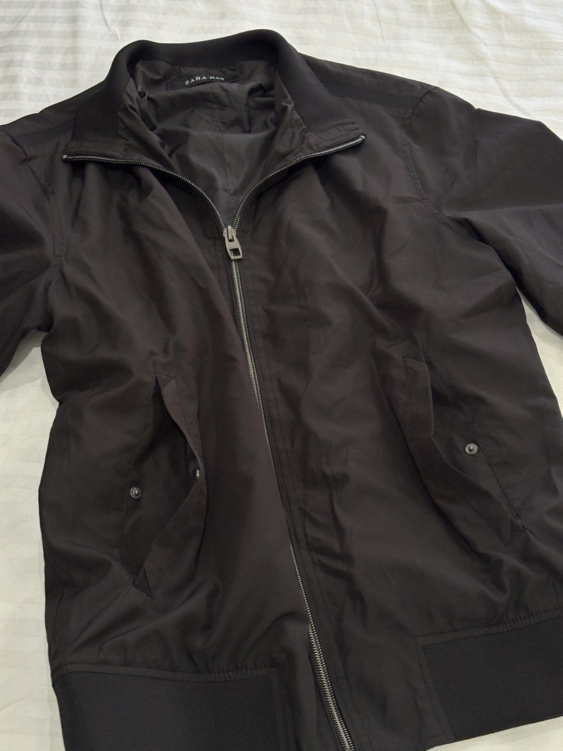 Zara Black Bomber Jacket | unisex nylon silver zip (Category: Coats, Jackets and Outerwear) located in Balanga. Submitted by cartsabeli (Listing ID 1469222333, Image 2). Description: So nice!! Unisex bomber jacket. Fits xxs-semi medium for women, fits xs-small men 😊 ₱990 + sf mop: gcash/maya mod: j&t .