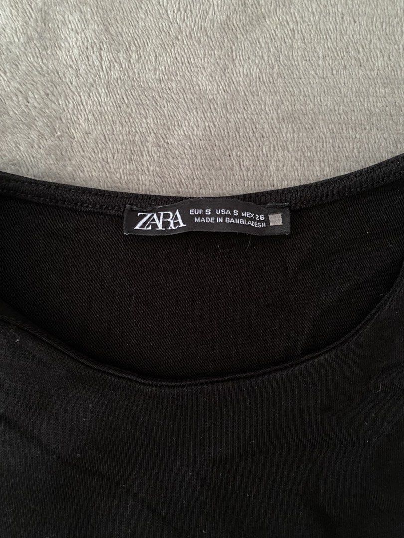 Zara Black Long Sleeve Top Size S (Category: Longsleeves) located in Manila. Submitted by love_mami (Listing ID 1469172340, Image 2). Description: - Brand: Zara - Style: Long sleeve top / basic layering piece - Color: Solid black - Size: S (tag inside) - Neckline: Classic crew neck - Fit: Fitted cut with good stretch - Material: Cotton or cotton-blend - Origin: Made in Bangladesh - Condition: Great everyday wardrobe staple.