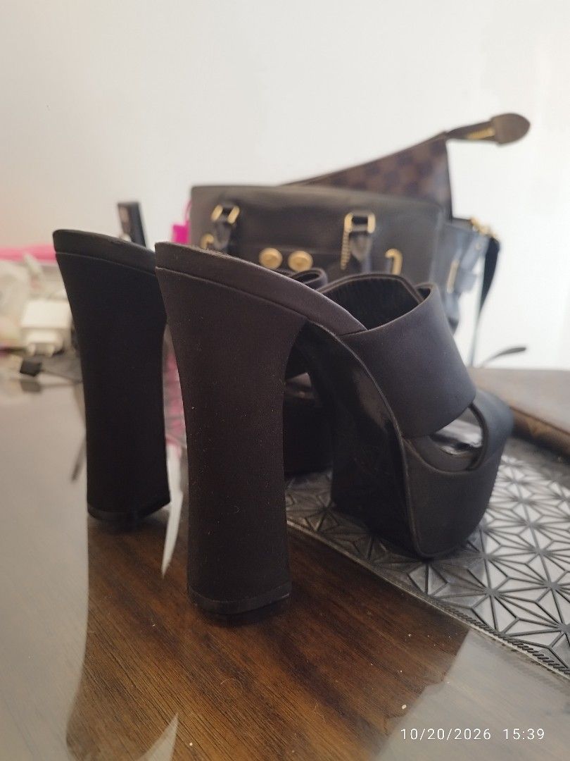 Authentic Zara Black Platform Mules Heels Size 37 (Category: Heels) located in Cebu City. Submitted by jplc24 (Listing ID 1469233121, Image 2). Description: - Condition: • Used a couple times but with Storage Flaw (Sole Crack): The fabric uppers, inner linings, and chunky heels are completely clean and pristine because these were just kept safely inside the cabinet. • The combination of humidity and lack of use causes the rubber or synthetic comp