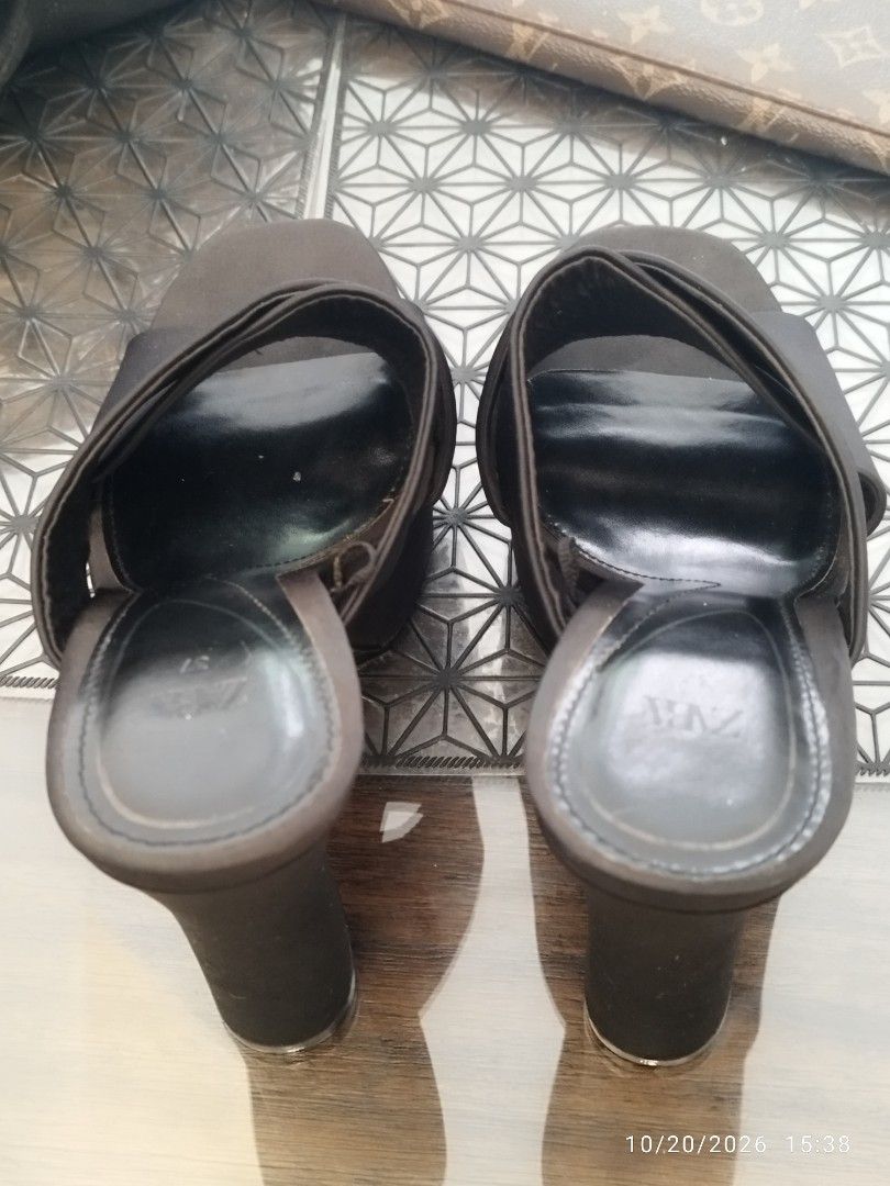 Authentic Zara Black Platform Mules Heels Size 37 (Category: Heels) located in Cebu City. Submitted by jplc24 (Listing ID 1469233121, Image 3). Description: - Condition: • Used a couple times but with Storage Flaw (Sole Crack): The fabric uppers, inner linings, and chunky heels are completely clean and pristine because these were just kept safely inside the cabinet. • The combination of humidity and lack of use causes the rubber or synthetic comp