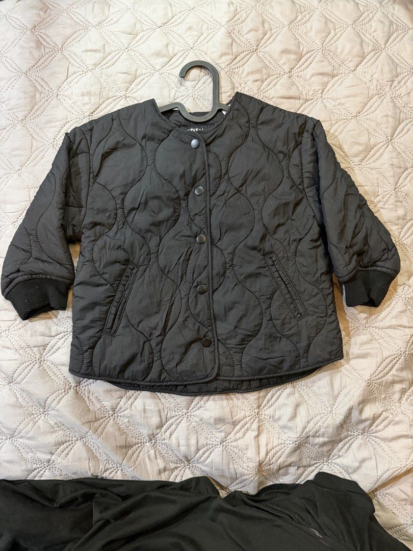 Zara Black Quilted Jacket Size 3-4 Years (Category: Babies & Kids Fashion) located in Paranaque City. Submitted by bperez (Listing ID 1469347268, Image 1). Description: - Brand: Zara - Item: Black quilted jacket for kids - Size: 3-4 years (104 cm) - Closure: Button-up front with dark buttons - Features: Ribbed cuffs and two front pockets - Condition: Lightweight, clean condition, great for cooler days.