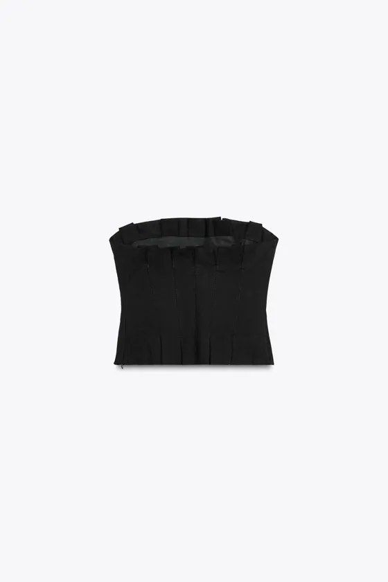 Zara Black Strapless Structured Tube Top (Category: Sleeveless) located in Cainta. Submitted by qualityyetaffordable (Listing ID 1469167379, Image 3). Description: - Brand: Zara - Style: Structured strapless top with pleated edge details - Color: Classic black - Size: S - Closure: Side zipper - Condition: Brand new with original store tag attached, never worn - Versatile piece, easy to style for any occasion.