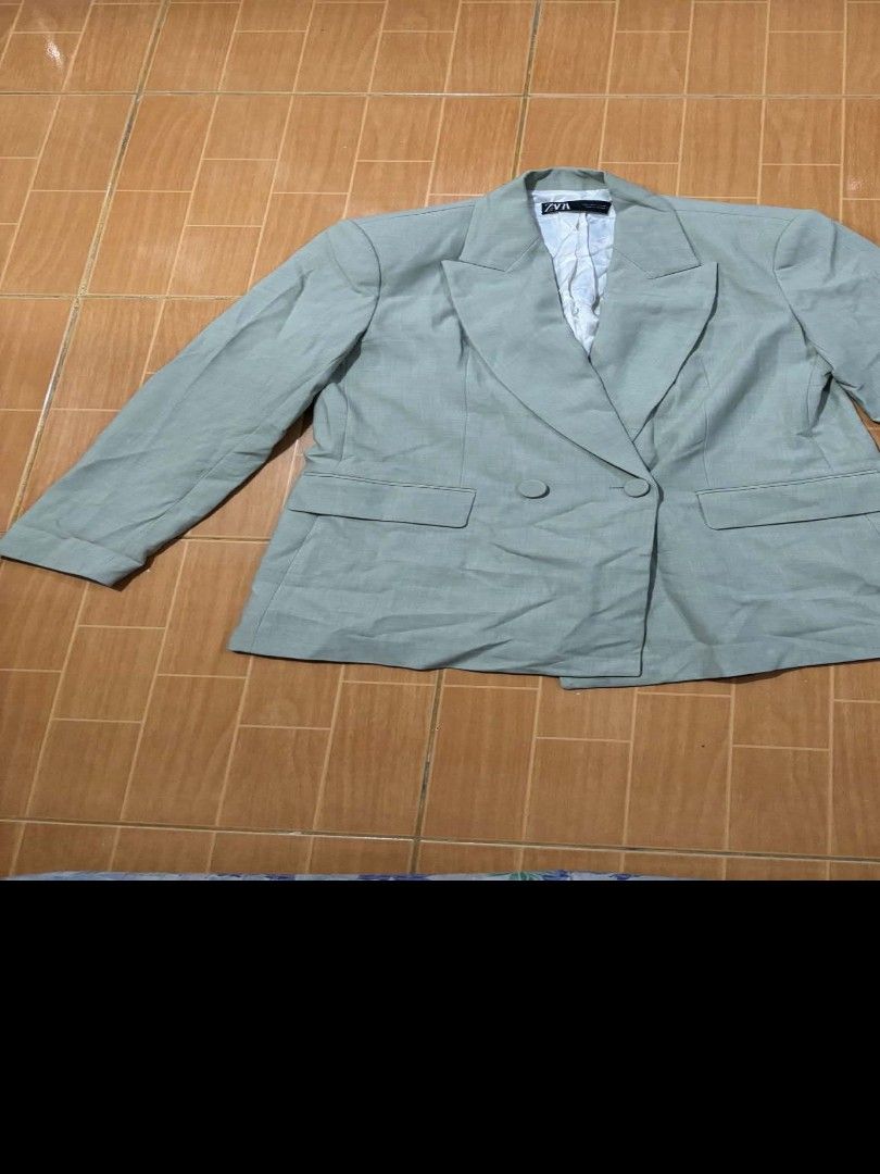 Zara Green Double Breasted Blazer Size L (Category: Coats, Jackets and Outerwear) located in Paranaque City. Submitted by poego (Listing ID 1469269511, Image 1). Description: - Brand: Zara - Style: Green double-breasted blazer with structured lapels and front button closure - Size: EUR L / USA L / MEX 30 - Material: 72% polyester, 24 (with white inner lining) - Origin: Made in Vietnam - Condition: Excellent pre-loved condition - Mode of Payment: 