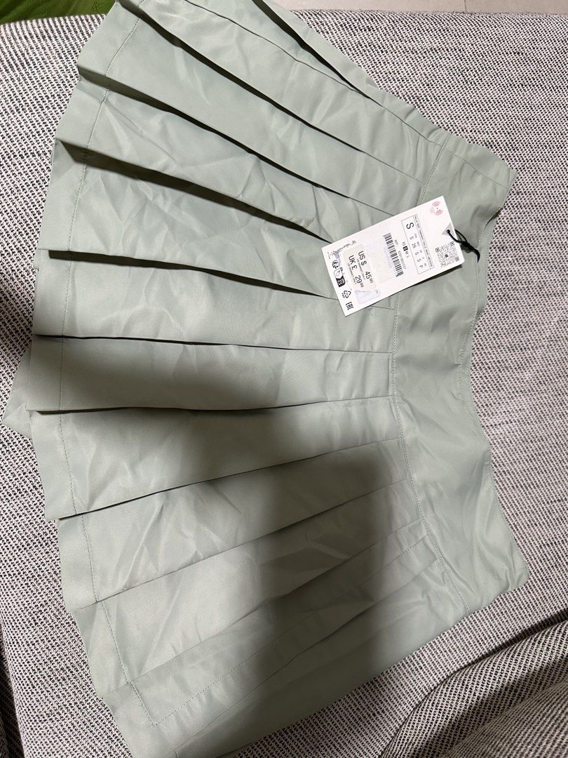 Zara Green Pleated Skort Size S (Category: Skirts) located in Cainta. Submitted by qualityyetaffordable (Listing ID 1469169617, Image 3). Description: - Brand: Zara - Item: Pleated skort with built-in shorts - Color: Light green - Size: S (Fits EUR S and USA S) - Condition: Brand new with tags (BNWT), never worn - Original price tags in USD and GBP attached.