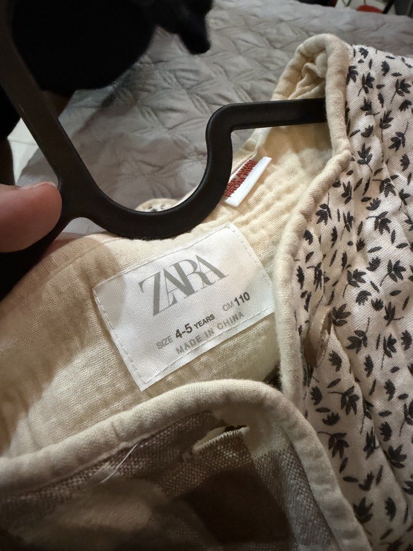 Zara Kids Patchwork Quilted Jacket Size 4-5 Years (Category: Babies & Kids Fashion) located in Paranaque City. Submitted by bperez (Listing ID 1469347479, Image 2). Description: - Brand: Zara - Size: 4-5 years (Height 110 cm) - Design: Mixed pattern patchwork (brown & grey gingham, floral print, cream cotton) with quilted texture - Features: Button-down front, round neckline - Condition: Good, warm outer layer for cooler weather.