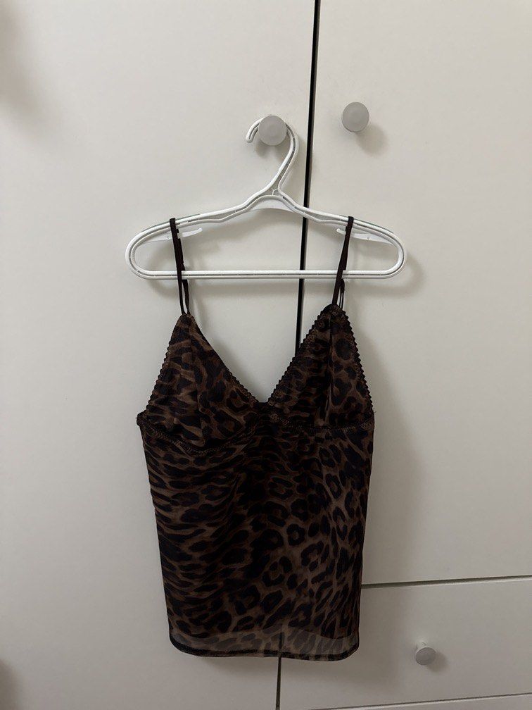 ZARA leopard top (Category: Sleeveless) located in Pasig City. Submitted by hotstuff__ (Listing ID 1469276141, Image 1). Description: .